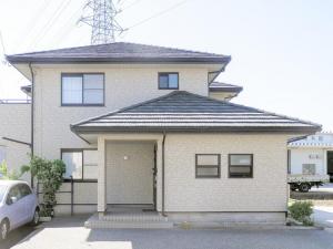 高岡市の屋根カバー工事　屋根雪の落ちにくいストーンチップ採用の金属屋根材施工で雪の多い北陸でもこれで安心！